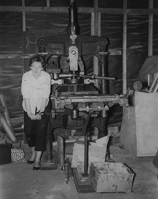 Judith Musgrove (later Professor Binney) and the Albion printing press at Auckland Museum, 1958-59