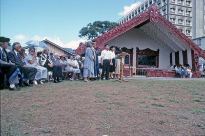 Gathering outside Waipapa Marae during opening, with waiata being performed