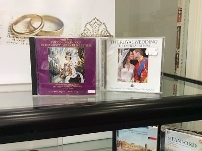 CD covers from royal events in library display