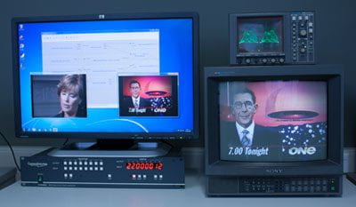 Media Services equipment used to digitise content from older formats, with televisions showing footage from previous TV broadcasts, including Sir Paul Holmes.