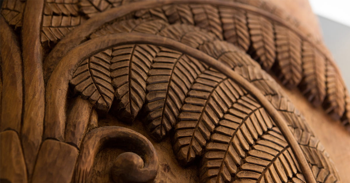 etail from Whakairo carved by Tim Coyre in Te Herenga Mātauranga Whānui (General Library).