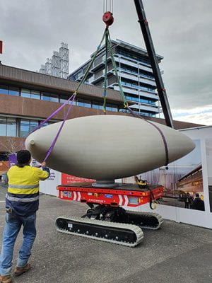 One of Chiara Corbelletto's Twins being loaded by crane onto a caterpillar for transport to Grafton campus